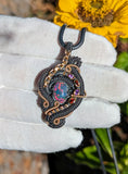 Black Ethiopian Opal, Garnet, and Amethyst Pendant