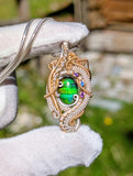 Ammolite, Sapphire, and Amethyst Pendant