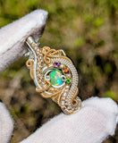 Ethiopian Opal, Hessonite Garnet, Amethyst, and Chrome Diopside Pendant