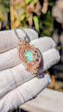 Ethiopian Opal, Emerald, and Amethyst Pendant