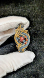 Black Ethiopian Opal and Garnet Pendant