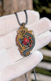 Black Ethiopian Opal and Garnet Pendant