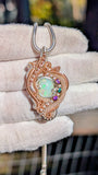 Ethiopian Opal, Emerald, and Amethyst Pendant