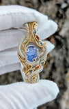 Tanzanite, Hessonite Garnet, and London Blue Topaz Pendant