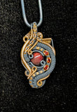 Black Ethiopian Opal and Garnet Pendant