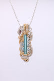 Pederneira Tourmaline, Ruby, Aquamarine, and Topaz Pendant